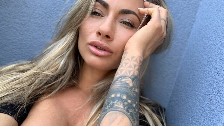 Blonde Bombshell Solo on Balcony